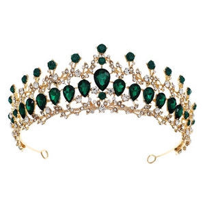 Detailed view of luxury bridal tiara with green pear-shaped gemstones and gold finish