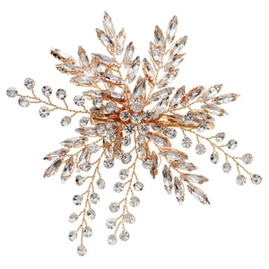 Close-up of gold wire bridal hair clip with marquise crystals and rhinestone branches