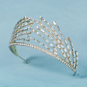 Luxurious bridal tiara crown with gold frame and sparkling rhinestones for wedding ceremonies