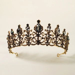 Detailed close-up of retro black crystal tiara with gold alloy hollow engraving