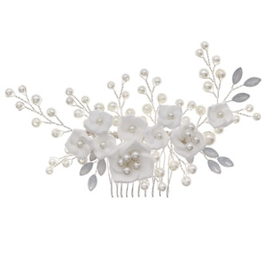 Detail of bridal hair comb with white fabric flowers, pearls, and silver wire beads