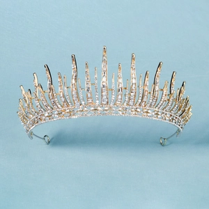 Detailed macro view of the gold crystal crown showing rectangular rhinestones and fix rings