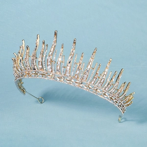 Detailed top view of gold alloy bridal crown with intricate clear crystal inlay