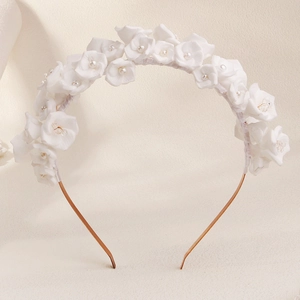 Elegant white floral bridal headband with handmade fabric flowers and pearls on gold wire