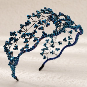 Deep blue crystal beaded headband with intricate mesh weaving in ethnic style