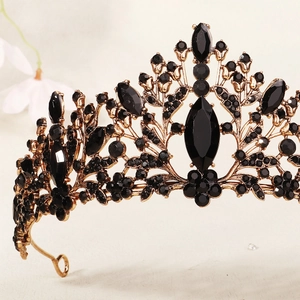 Vintage gold crown with black gemstones and intricate floral gothic details for girls
