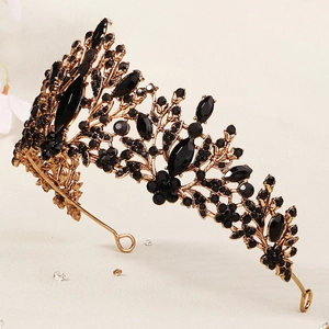 Vintage black and gold gothic crown with intricate hollow carvings for Halloween parties