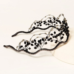 Elegant vintage black crystal beaded headband with gold accents and crown leaf design