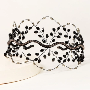 Detail of handcrafted black crystal beaded crown headband with vintage mesh wire design
