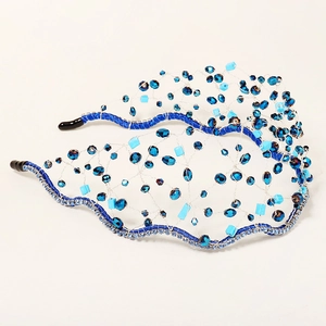 Handmade blue crystal beaded mesh headband with intricate crown styling and luxury details