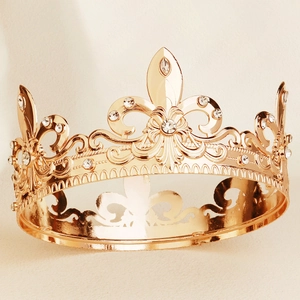 Vintage Baroque gold metal crown with intricate fleur-de-lis patterns and clear rhinestones
