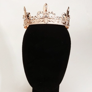 Detailed macro view of rose gold Baroque crown featuring intricate floral rhinestone patterns
