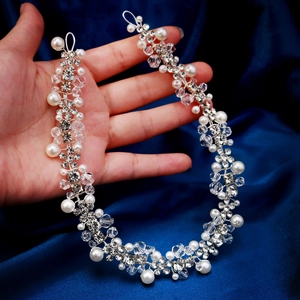 Elegant silver vine bridal hairpiece with pearls and rhinestones for wedding ceremonies