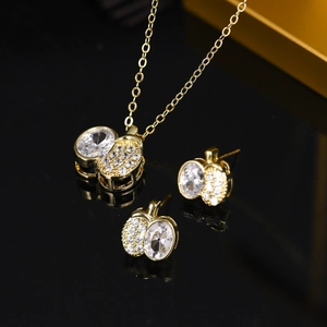 Elegant gold zircon jewelry set with oval crystal necklace and matching stud earrings