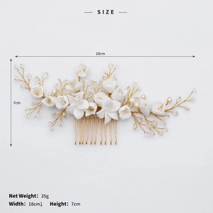 Detail view of handmade bridal hair comb with dimensions 18cm by 7cm in white and gold