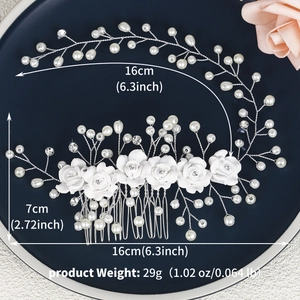 Detail view of handmade bridal hair comb with clay flowers, pearls and crystals
