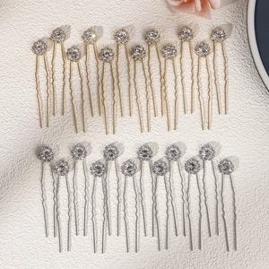 Detail of 20Pcs gold and silver bridal U-shape hair pins with rhinestone flower clusters