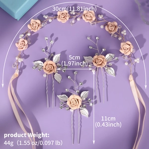 Detailed view of handmade pink floral hairband and pins with pearls and crystal beads