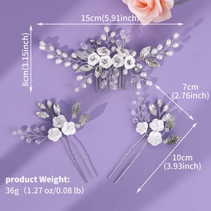 Detail showing bridal hair pins with handmade white flowers, pearls and crystals