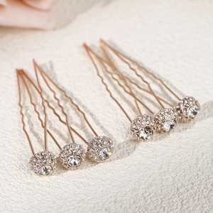 Set of six rose gold U-shaped hair pins featuring sparkling rhinestone spherical accents