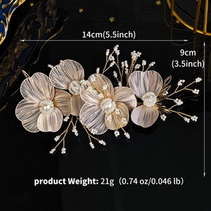 Detailed view of handmade gold wire flower hairpiece with pearls showing dimensions 14x9cm
