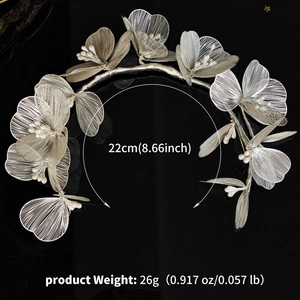 Detail of handmade silver wire floral headpiece with pearls and 22cm diameter size