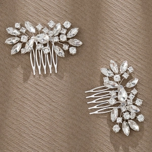 Macro detail of silver rhinestone hair comb set with sparkling floral crystal patterns