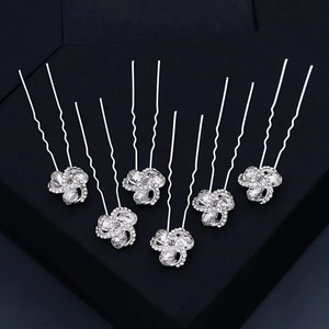 Detail view of 6 silver bridal U-shaped hair pins with sparkling rhinestone flower clusters