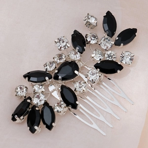 Detailed view of handmade silver bridal hair comb with black and clear rhinestones