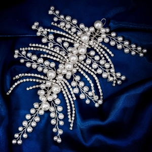 Exquisite bridal pearl and rhinestone headband with tassels on blue satin fabric