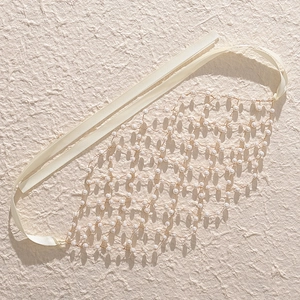 Bandeau ethnique fait main avec perles et strass pour photographie de vacances à la plage