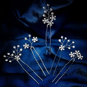 Five-piece set of bridal rhinestone flower hair pins with silver finish on blue silk