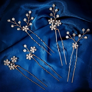 Set of 5 gold bridal hair pins with shimmering rhinestones and floral wire design
