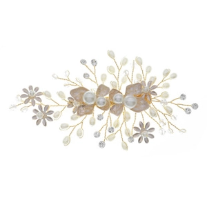 Macro view of handmade gold wire hair comb with pearls, frosted petals and crystals