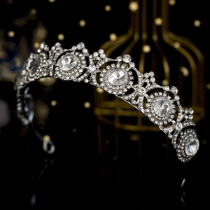 Detailed macro shot of silver alloy bridal crown with sparkling sunflower rhinestones
