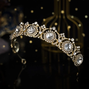 Luxurious gold flower bridal crown with sparkling rhinestones and elegant reflections
