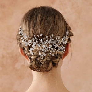 Detailed back view of handmade bridal hair vine with crystal beads and white floral accents