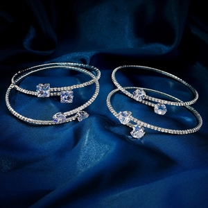 Macro view of sparkling rhinestone bracelets with square and heart cut stones
