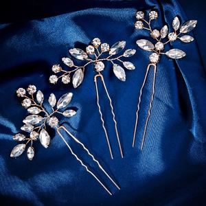Elegant rose gold bridal hair pin set with sparkling crystals for wedding hairstyles