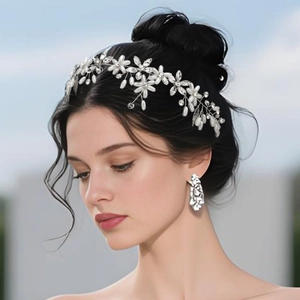 Detail of handcrafted bridal headband with white pearls and crystals on a female model