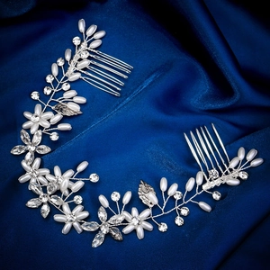 Elegant handmade bridal hair vine with white pearls and crystals on blue silk