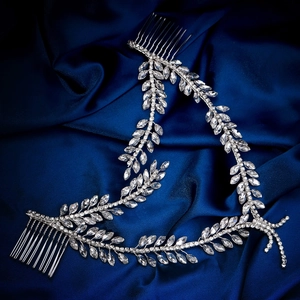 Exotic silver bridal headpiece set with sparkling marquise rhinestones on blue silk