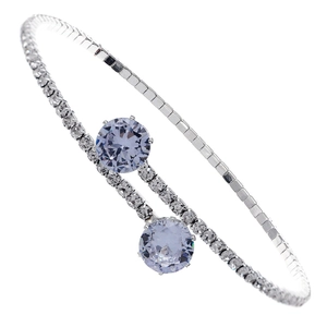 Sparkling silver bangle with lavender crystals and micro-pave rhinestones on white background