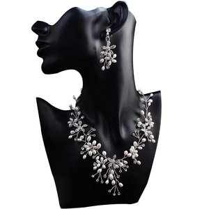 Exquisite bridal jewelry set with handmade pearls and floral crystal necklace earrings