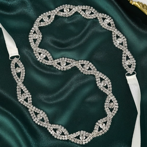 Elegant bridal sash with hand-sewn silver rhinestones and white satin ribbon on silk
