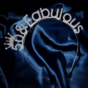 Detail of 50 & Fabulous silver tiara headband with sparkling rhinestones on blue silk