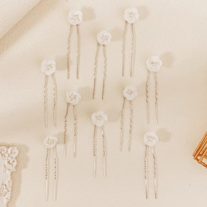 Set of 10 white clay flower hair pins with pearl centers and silver U-shaped metal clips