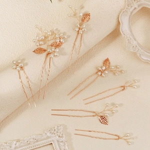 7-piece gold bridal hair pin set with handmade metal leaves and white pearls