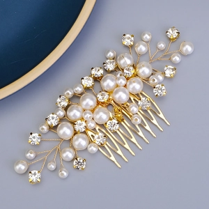 Close-up detail of bridal hair comb with elegant white pearls and sparkling rhinestones
