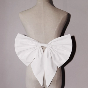 Elegant large white fabric bow with long tails for children's princess dress decoration
